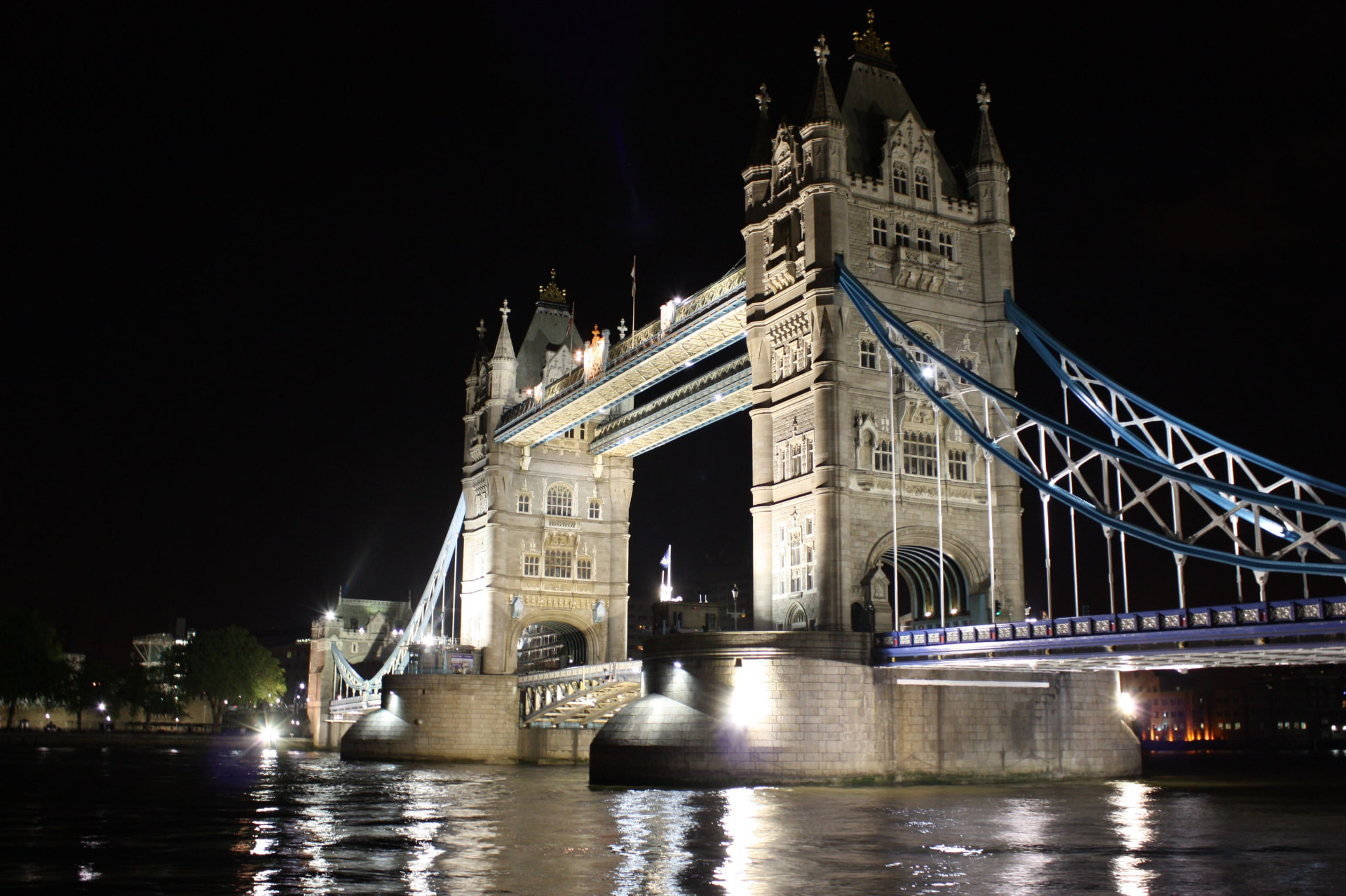 Tower Bridge and the London skyline viewed beside an executive vehicle
